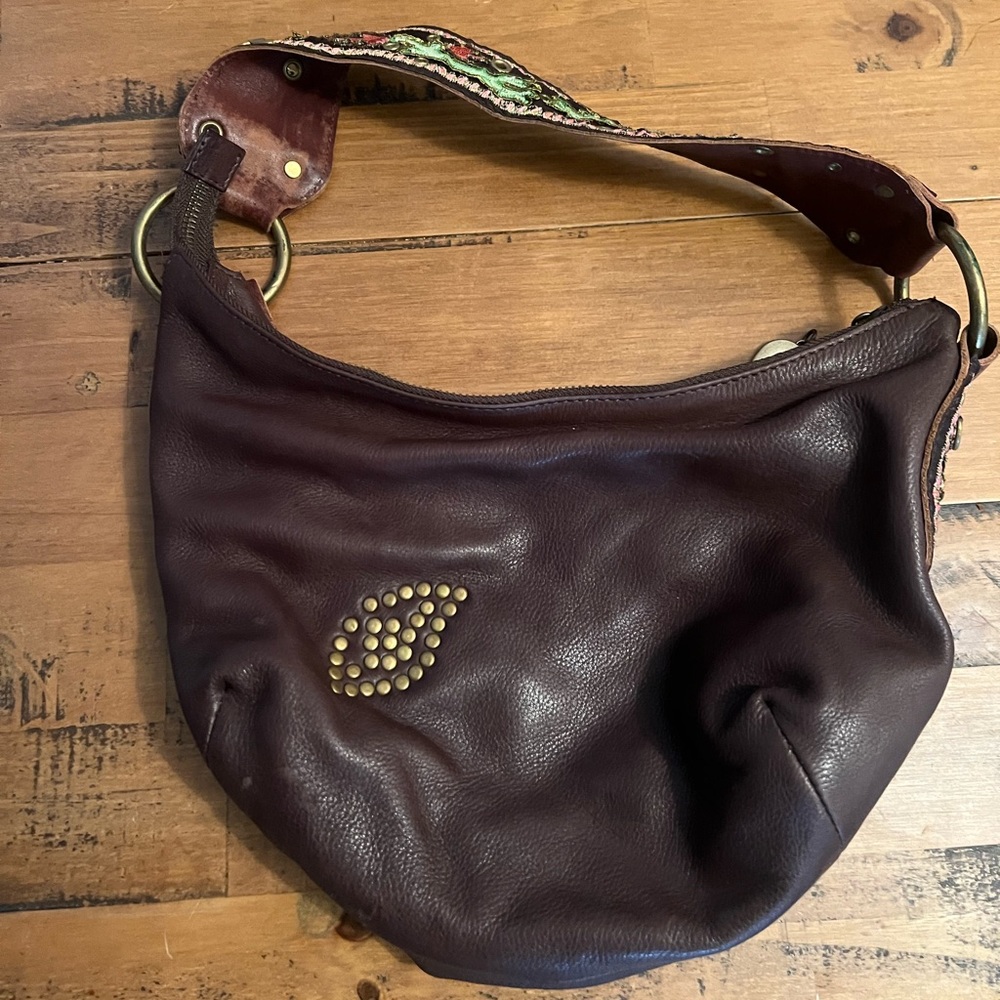 Beautiful brown leather Betsey Johnson top zip hobo with embellished strap